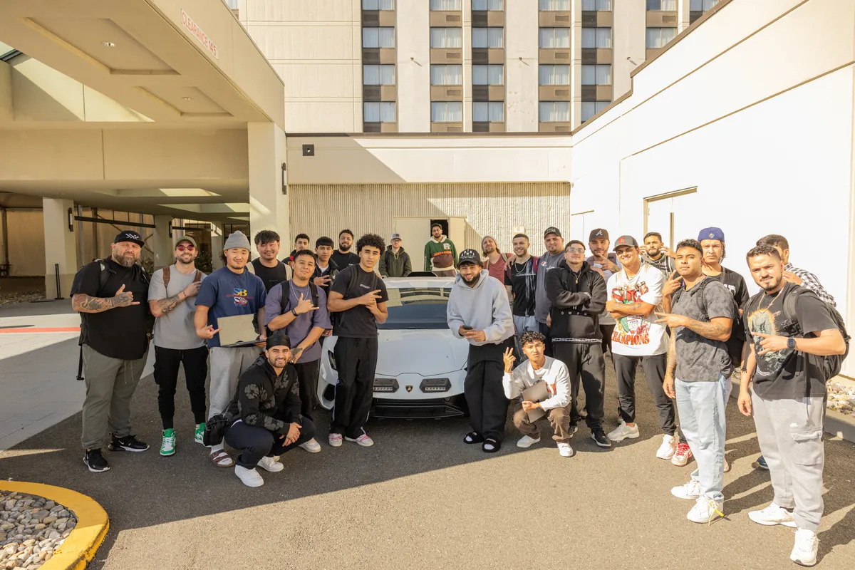 Nour with a large group of StockHours students at a live meetup